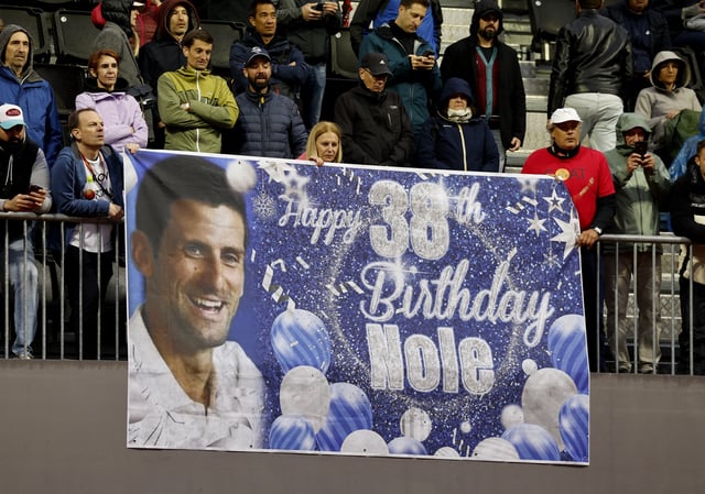 Tennis - Geneva Open - Tennis Club de Geneve, Geneva, Switzerland - May 22, 2025 Fans display a banner in the stands wishing Serbia's Novak Djokovic a happy birthday during his quarter final match against Italy's Matteo Arnaldi REUTERS/Stefan Wermuth