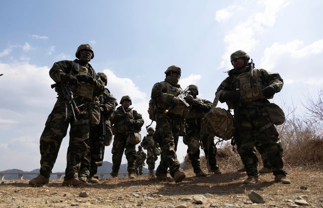 US soldiers from the 11th Engineer Battalion and 2nd Infantry Combined Division participate in the joint river-crossing exercise conducted for South Korean and US soldiers in Yeoncheon, Gyeonggi province, South Korea, 20 March 2024. JEON HEON-KYUN/Pool via REUTERS/File Photo