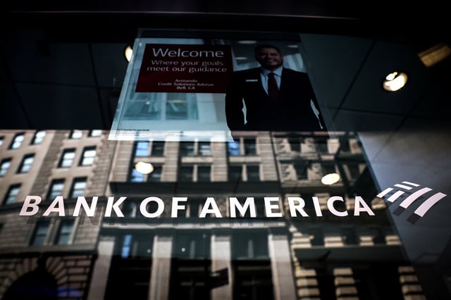 A Bank of America logo is seen on the entrance to a Bank of America financial center in New York City, U.S., July 11, 2023.  REUTERS/Brendan McDermid/File Photo