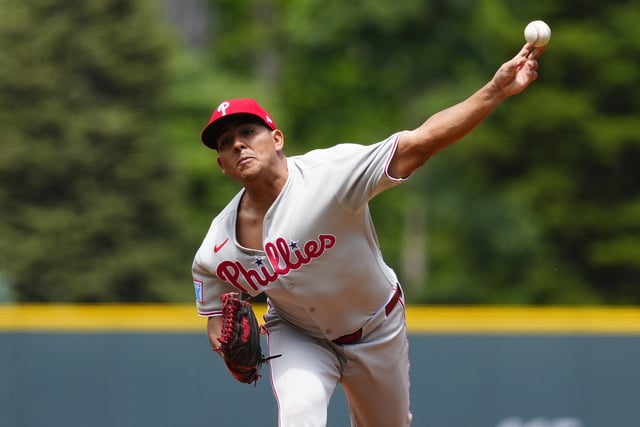 May 22, 2025; Denver, Colorado, USA; Philadelphia Phillies starting pitcher Ranger Suarez (55) delivers a pitch in the first inning against the Colorado Rockies at Coors Field. Mandatory Credit: Ron Chenoy-Imagn Images
