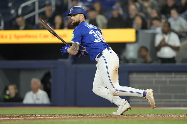 May 22, 2025; Toronto, Ontario, CAN; Toronto Blue Jays right fielder Nathan Lukes (38) hits a  walk off single during the eleventh inning against the San Diego Padres at Rogers Centre. Mandatory Credit: John E. Sokolowski-Imagn Images