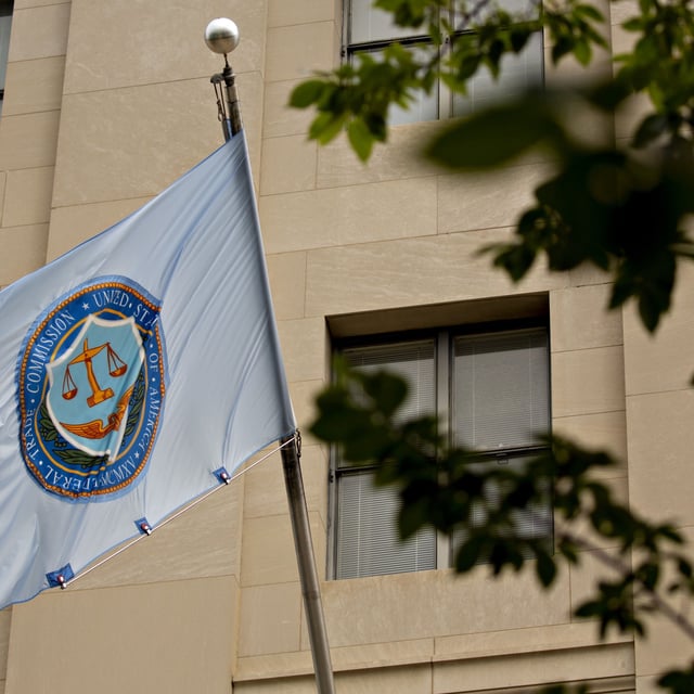 A U.S. Federal Trade Commission (FTC) flag flies outside the headquarters in Washington, D.C., U.S., on Thursday, Aug. 15, 2019.