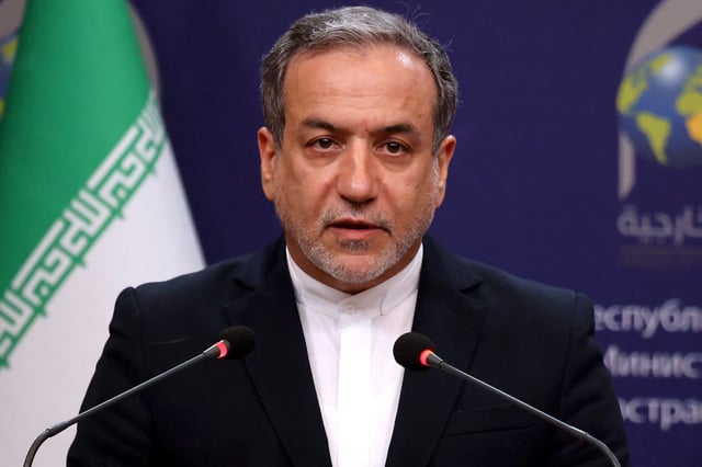 Iranian Foreign Minister Abbas Araghchi attends a press conference with his Syrian and Iraqi counterparts (not pictured), after a trilateral meeting in Baghdad, on December 6, 2024. Fuad Hussein said his country must guard against attack, as Islamist-led rebels pressed a shock offensive in neighbouring Syria. (Photo by AHMAD AL-RUBAYE / AFP) (Photo by AHMAD AL-RUBAYE/AFP via Getty Images)