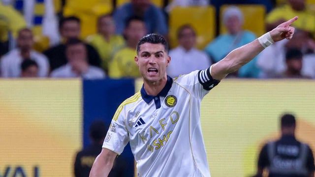 Cristiano Ronaldo gestures during a Saudi Pro League football match.