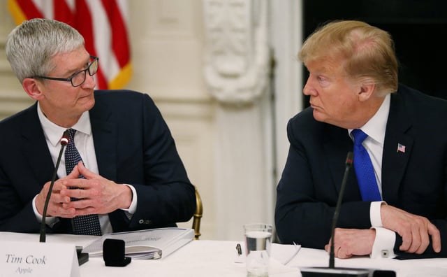 Apple CEO Tim Cook speaks as he and President Donald Trump participate in an American Workforce Policy Advisory Board meeting in the White House State Dining Room in Washington, on March 6, 2019.