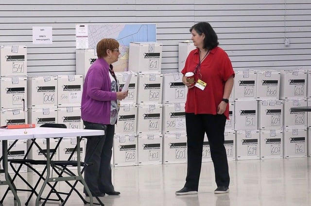  Elections Canada staff are shown at the returning office in Tecumseh on Wednesday, May 21, 2025, amid a recount for Windsor-Tecumseh-Lakeshore.