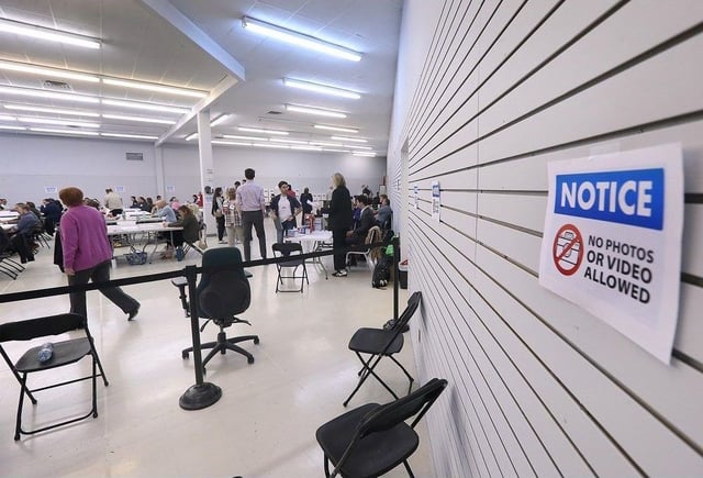  Elections Canada staff and Liberal and Conservative scrutineers are shown at the returning office in Tecumseh on Wednesday, May 21, 2025 where a ballot recount was underway for the federal riding of Windsor-Tecumseh-Lakeshore.