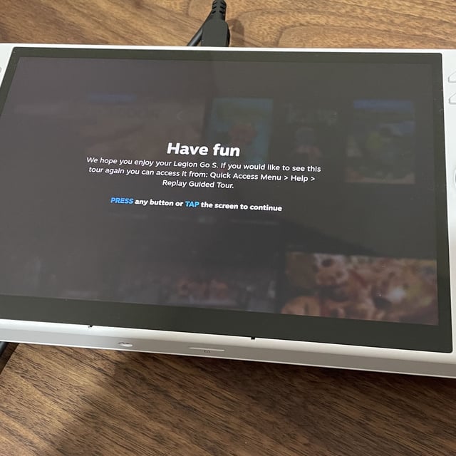 Lenovo Legion Go S with SteamOS installed showing a splash screen that says 'Have fun'