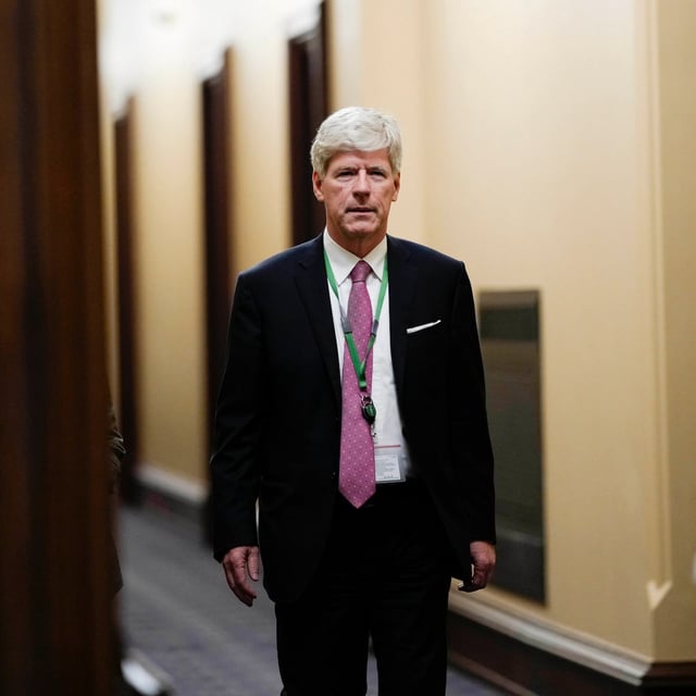 Minister of Energy and Natural Resources Tim Hodgson arrives for a meeting of the federal cabinet in West Block on Parliament Hill in Ottawa on May 14.