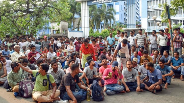 Teachers and non-teaching staff stage a sit-in protest against police lathi-charge on protesters on May 15 in front of Bikash Bhawan during a protest. (ANI FILE)