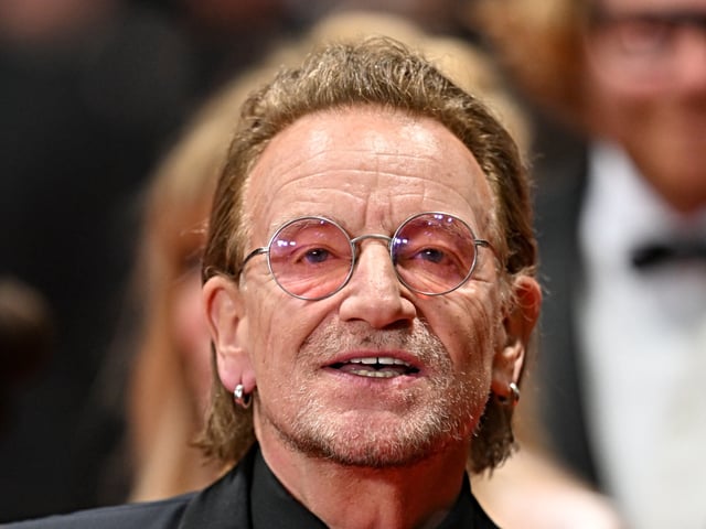 CANNES, FRANCE - MAY 16: Irish singer-Songwriter and executive producer Bono arrives for the screening of the film 'Bono: Stories of Surrender' at the 78th edition of the Cannes Film Festival in Cannes, France, on May 16, 2025. (Photo by Mustafa Yalcin/Anadolu via Getty Images)