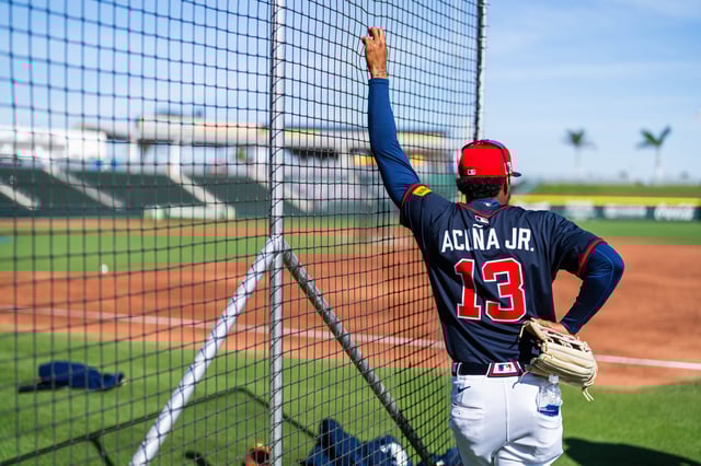 NORTH PORT, FLORIDA - FEBRUARY 21: Ronald Acuña Jr. #13 of the Atlanta Braves looks on during a spring training workout at CoolToday Park on February 21, 2025 in North Port, Florida.
