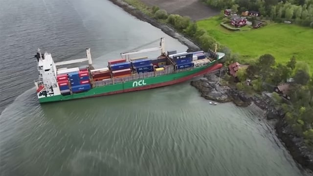 The NCL Salten run aground in a homeowner's garden.