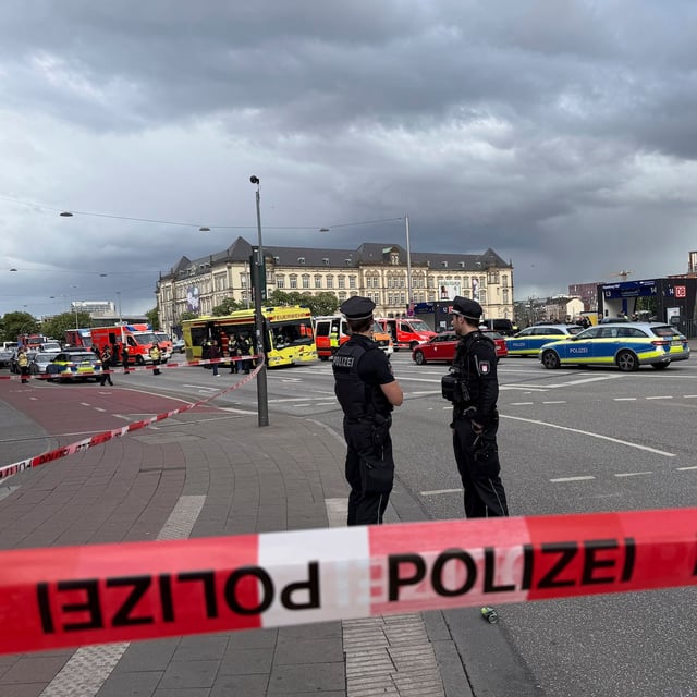 Police near the scene of a stabbing at Hamburg Central Station in Hamburg, Germany, Friday, May 23, 2025. (Steven Hutchings/dpa via AP)