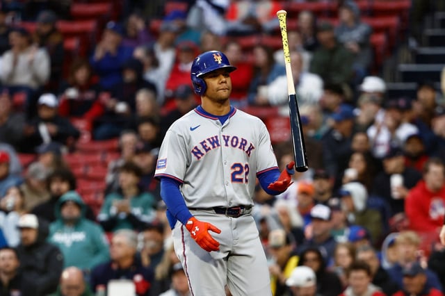 BOSTON, MA - MAY 20: Juan Soto #22 of the New York Mets flips his bat as he heads for the dugout after striking out against the Boston Red Sox during the first inning at Fenway Park on May 20, 2025 in Boston, Massachusetts. (Photo By Winslow Townson/Getty Images)