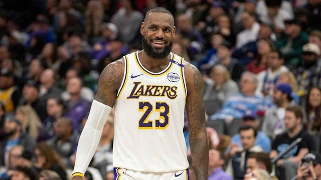 Los Angeles Lakers forward James smiles after his team scored against the Sacramento Kings at Golden 1 Center.