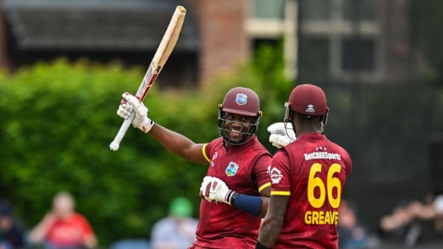 Matthew Forde celebrates his half-century against Ireland