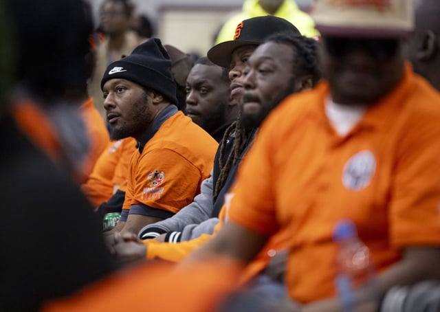Violence interrupters are honored as community leaders, including Mayor Brandon Johnson, gathered to celebrate a state-funded anti-violence program on April 17, 2025, at the Pullman Community Center in Chicago. How Illinois will fund violence prevention  is subject to negotiations in the General Assembly ahead of a May 31 deadline. (Brian Cassella/Chicago Tribune)