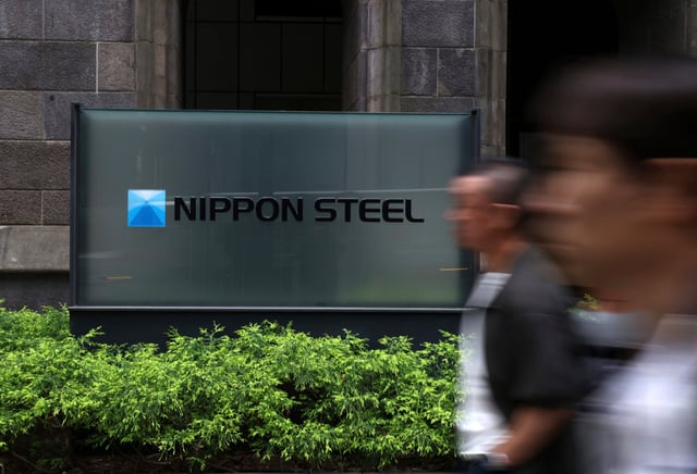 A photo shows a logo hanging at Nippon Steel Corporation's headquarters in Chiyoda Ward, Tokyo on May 24, 2025. Regarding Nippon Steel's plan to acquire the American steel giant U.S. Steel, U.S. President Trump expressed his intention to approve the "planned partnership" between the two companies on his social media account on the 23rd. He emphasized that jobs would be created and huge economic benefits would be generated, and Western media reported that he had "approved the acquisition." ( The Yomiuri Shimbun via AP Images )