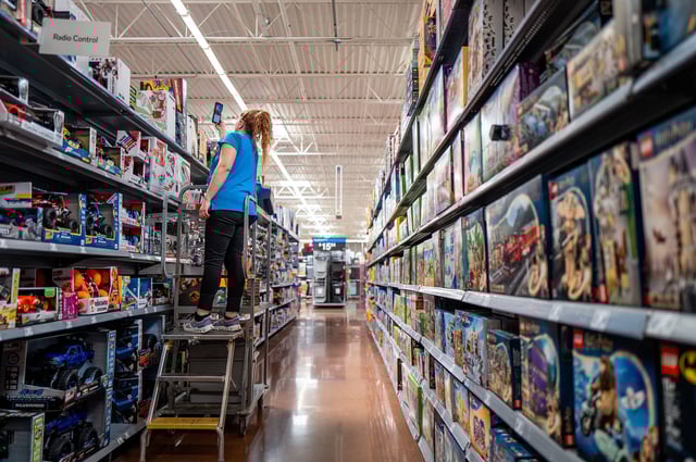 An employee counts inventory in a Walmart Supercenter on May 15, 2025 in Austin, Texas. Walmart surpassed first-quarter earnings estimate, while falling short of quarterly sales. Chief Financial Officer John David Rainey has said that consumers could begin to see price hikes as early as later this month due to the various newly enacted Trump administration tariffs.