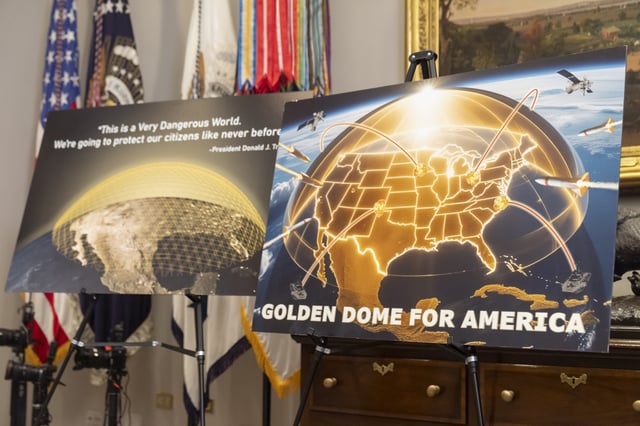 Posters for the proposed Golden Dome for America missile defense shield are displayed before an event with U.S. President Donald Trump in the Roosevelt Room at the White House on May 12, 2025, in Washington. (AP Photo/Mark Schiefelbein)