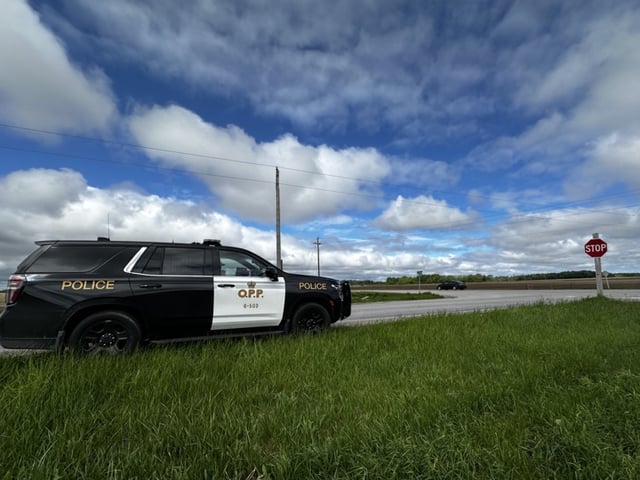An Ontario Provincial Police cruiser remained at the scene of a crash at the intersection of Thorndale and Cobble Hills roads that killed five one night prior. Photo taken on Saturday May 24, 2025. Jonathan Juha/ The London Free Press