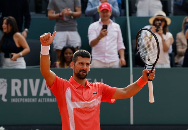 Novak Djokovic celebrates after winning the Geneva Open.