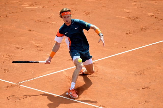Tennis - Hamburg European Open - Am Rothenbaum, Hamburg, Germany - May 24, 2025 Russia's Andrey Rublev in action during the final match against Italy's Flavio Cobolli REUTERS/Fabian Bimmer