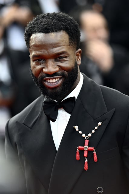 Ṣọpẹ́ Dìrísù attends the "The Phoenician Scheme" red carpet on May 18, 2025, the day before his film "My Father's Shadow" premiered at the festival.