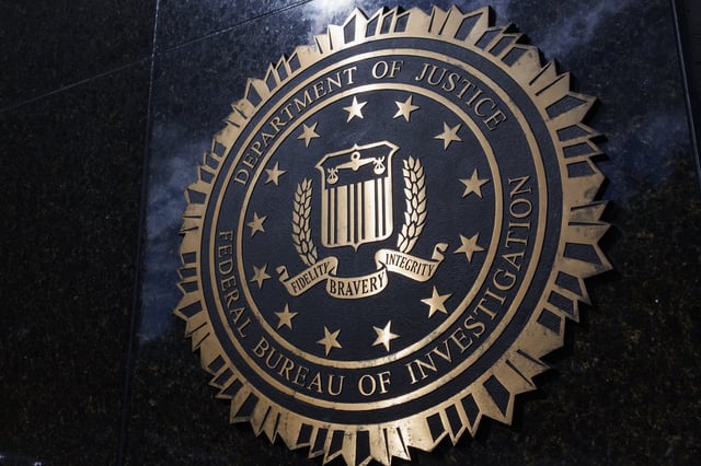 A sign is displayed outside of the J. Edgar Hoover Federal Bureau of Investigation (FBI) building on May 18, 2025 in Washington, DC.