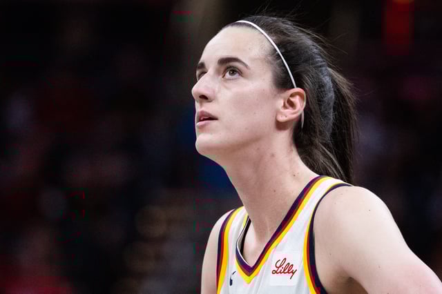 May 24, 2025; Indianapolis, Indiana, USA; Indiana Fever guard Caitlin Clark (22) in the first half against the New York Liberty at Gainbridge Fieldhouse. Mandatory Credit: Trevor Ruszkowski-Imagn Images