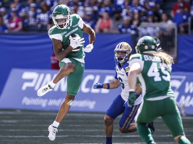 Saskatchewan Roughriders' KeeSean Johnson (3) catches the pass during first half CFL action against the Winnipeg Blue Bombers in Winnipeg, Saturday, May 24, 2025.