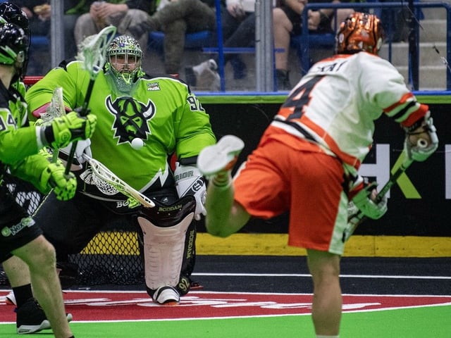 Saskatchewan Rush goaltender Frank Scigliano stops a shot from Buffalo Bandits transition Ian MacKay during Game 2 of the National Lacrosse League finals in Saskatoon on Sunday, May 18, 2025. .