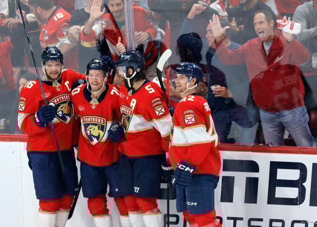 Florida Panthers center Aleksander Barkov (16), center Jesper Boqvist (70), defenseman Aaron Ekblad (5), and defenseman Gustav Forsling (42) celebrate a goal by Boqvist during Game 3 of the Stanley Cup Eastern Conference finals on Saturday, May 24, 2025, at Amerant Bank Arena in Sunrise. (Joe Cavaretta/South Florida Sun Sentinel)