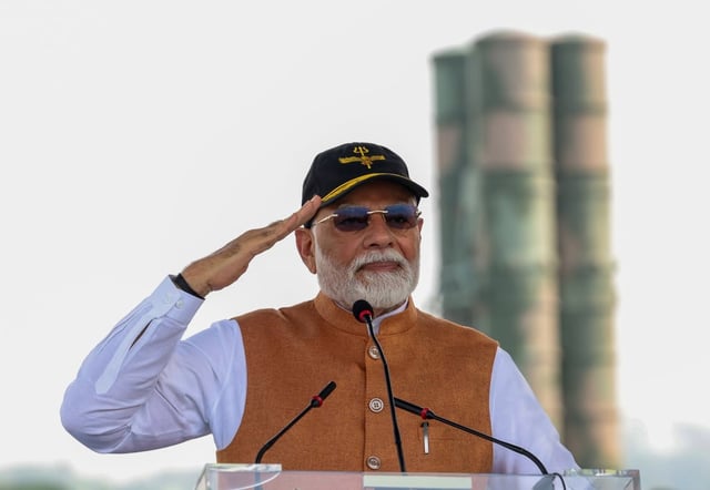 Indian Prime Minister Narendra Modi salutes servicemen at an air base in Punjab on May 13. Photo: Indian Press Information Bureau/EPA-EFE