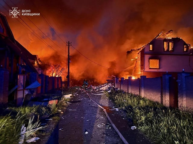 Firefighters in the aftermath of a Russian strike in Kyiv (Photo: Ukraine State Emergency Services/AFP/Getty)