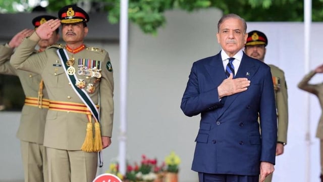Pakistan's Prime Minister Shehbaz Sharif and Chief of the Army Staff (COAS) Asim Munir at the passing out ceremony at the Pakistan Military Academy Kakul, Abbottabad, on April 26.