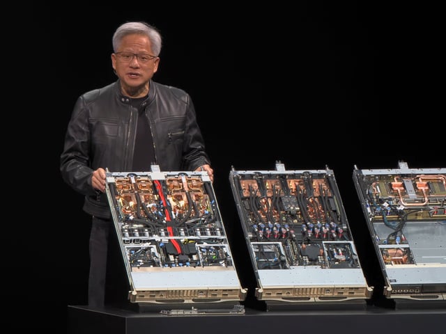 Nvidia CEO Jensen Huang Next to a B200 Node