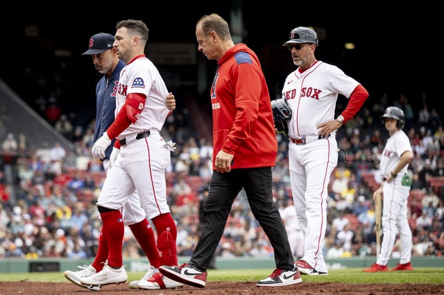 BOSTON, MASSACHUSETTS - MAY 23: Alex Bregman #2 of the Boston Red Sox exits the game during the fifth inning of game one of a doubleheader against the Baltimore Orioles at Fenway Park on May 23, 2025 in Boston, Massachusetts.