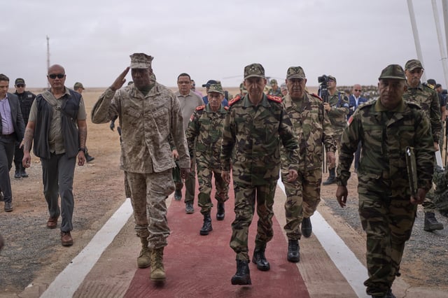 Gen. Michael Langley, USMC, Commander, U.S. Africa Command, center, and Major General Mohammed Berrid, Inspector General of Moroccan Royal Armed Forces, attend the 21st edition of the African Lion military exercise, in Tantan, south of Agadir, Morocco, Friday, May 23, 2025. (AP Photo/Mosa'ab Elshamy)