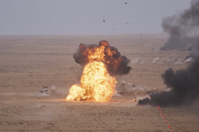 A target is hit with artillery fire as U.S and Moroccan military forces take part in the 21st edition of the African Lion military exercise, in Tantan, south of Agadir, Morocco, Friday, May 23, 2025. (AP Photo/Mosa'ab Elshamy)