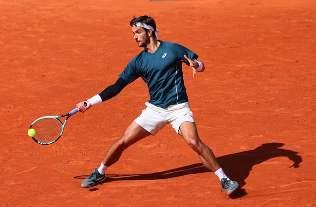 Tennis - French Open - Roland Garros, Paris, France - May 25, 2025 Italy's Lorenzo Musetti in action during his first round match against Germany's Yannick Hanfmann REUTERS/Denis Balibouse