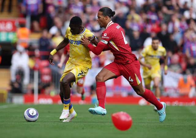 Soccer Football - Premier League - Liverpool v Crystal Palace - Anfield, Liverpool, Britain - May 25, 2025 Crystal Palace's Ismaila Sarr in action with Liverpool's Virgil van Dijk REUTERS/Phil Noble