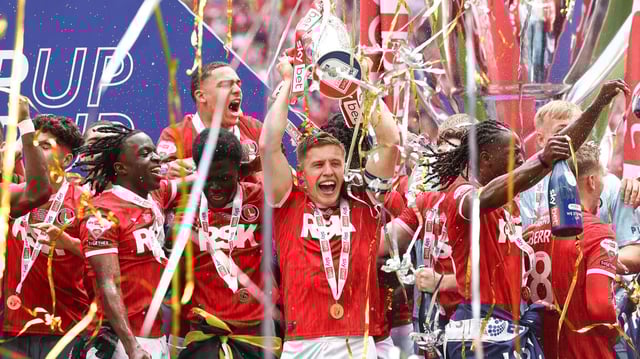 Charlton celebrating after clinching a return to the second tier for the first time since 2020