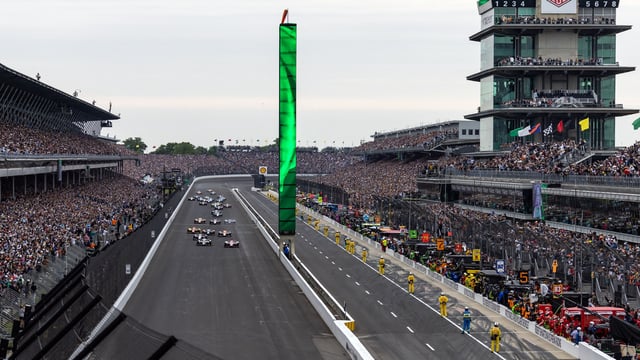 IndyCar Series drivers take the green flag to begin the 109th Running of the Indianapolis 500 at Indianapolis Motor Speedway