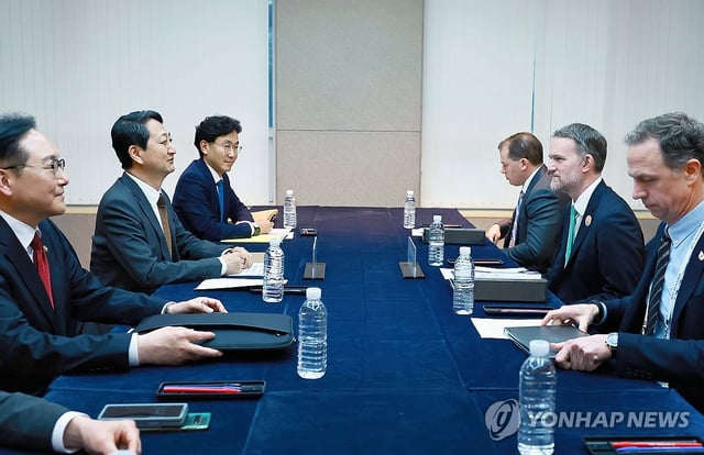 This file photo provided by the Ministry of Trade, Industry and Energy shows a South Korean delegation, led by Industry Minister Ahn Duk-geun, holding talks with a U.S. delegation, led by U.S. Trade Representative Jamieson Greer, on the sidelines of the APEC trade ministers' meeting on South Korea's Jeju Island on May 16, 2025. (PHOTO NOT FOR SALE) (Yonhap)