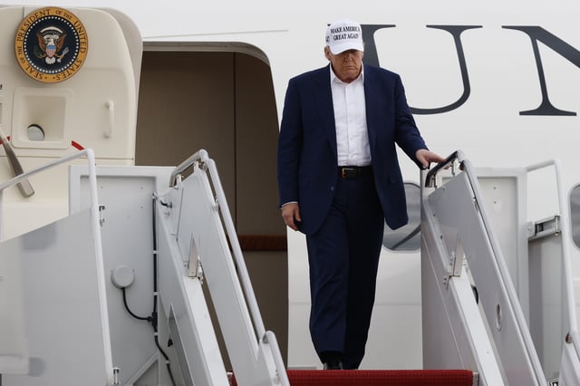 President Donald Trump walks down the stairs of Air Force One upon his arrival at Joint Base Andrews, Md., Sunday, May 25, 2025. (AP Photo/Luis M. Alvarez)