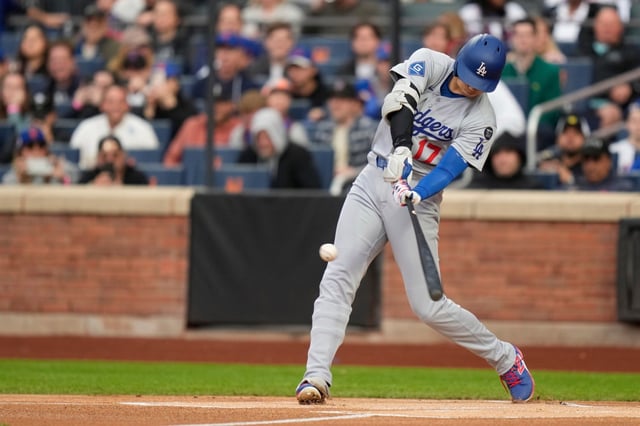 Dodgers’ Shohei Ohtani hits a solo home run during the first inning of a baseball game against the New York Mets, Sunday, May 25, 2025, in New York. (AP Photo/Seth Wenig)