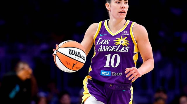 Kelsey Plum (10) of the Los Angeles Sparks controls the ball against the Chicago Sky in the second half at Crypto.com Arena on Sunday, May 25, 2025, in Los Angeles. (Ronald Martinez/Getty Images/TNS)
