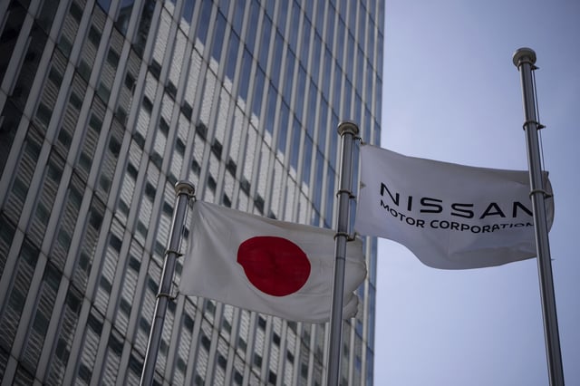 Nissan signage at Nissan headquarters in Yokohama, Tuesday, May 13, 2025. (AP Photo/Louise Delmotte)